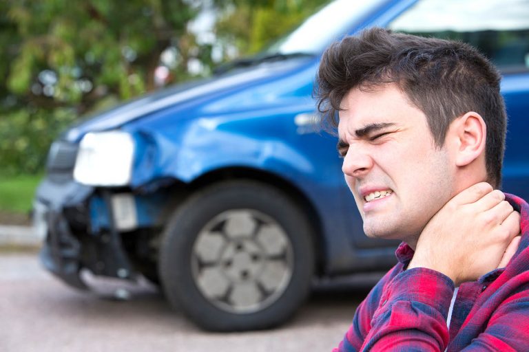 Male Motorist Suffering From Whiplash After Car Accident Car Accident Claim Helpline