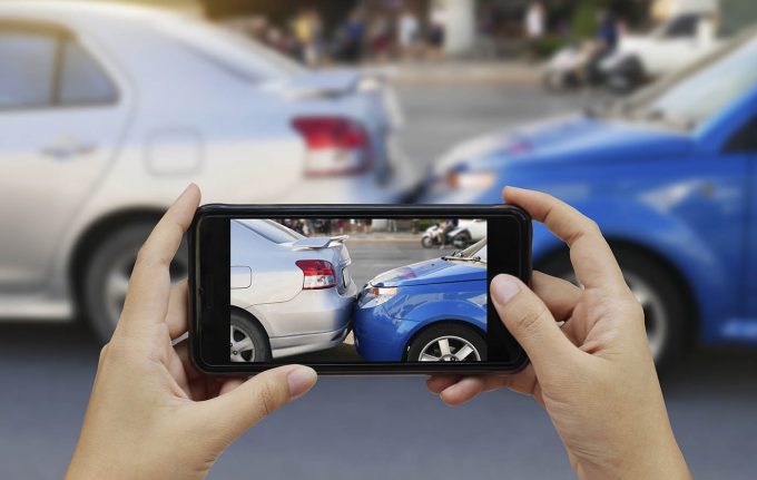 Close up hand holding smartphone and take photo